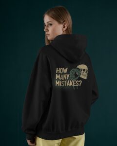 rear-view-hoodie-mockup-against-dark-green-wall-0154
